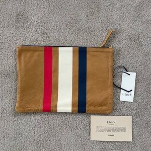 Clare V. flat clutch with blue white and red stripes